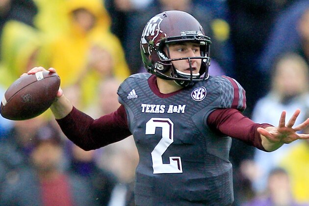 BATON ROUGE, LA - NOVEMBER 23:  Quarterback Johnny Manziel #2 of the Texas A&M Aggies drops back to pass against the LSU Tigers at Tiger Stadium on November 23, 2013 in Baton Rouge, Louisiana.  (Photo by Sean Gardner/Getty Images)