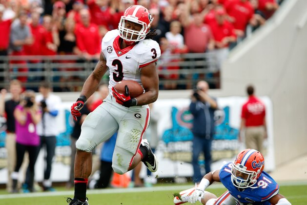 JACKSONVILLE, FL - NOVEMBER 02:  Todd Gurley #3 of the Georgia Bulldogs runs for yardage during the game against the Florida Gators at EverBank Field on November 2, 2013 in Jacksonville, Florida.  (Photo by Sam Greenwood/Getty Images)