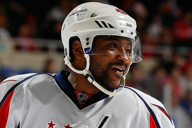UNIONDALE, NY - APRIL 05:  Joel Ward #42 of the Washington Capitals skates against the New York Islanders at Nassau Veterans Memorial Coliseum on April 5, 2014 in Uniondale, New York. The Capitals defeated the Islanders 4-3.  (Photo by Mike Stobe/NHLI via Getty Images)