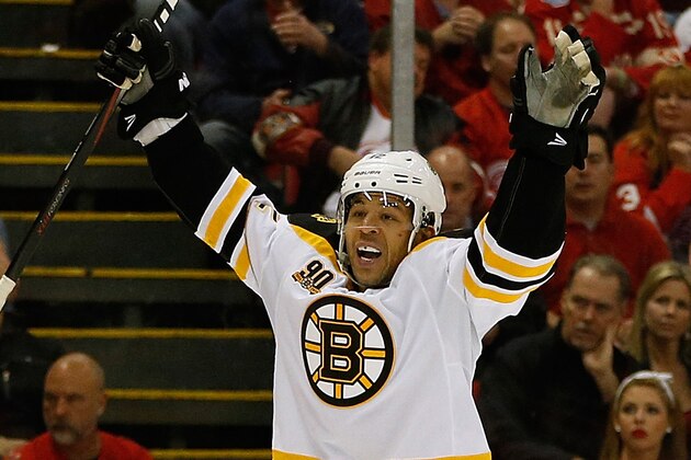 DETROIT, MI - APRIL 24:  Jarome Iginla #12 of the Boston Bruins celebrates his game-winning overtime goal with Dougie Hamilton #27 to beat the Detroit Red Wings 3-2 in Game Four of the First Round of the 2014 NHL Stanley Cup Playoffs at Joe Louis Arena on April 24, 2014 in Detroit, Michigan. (Photo by Gregory Shamus/Getty Images)