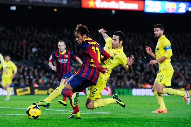 BARCELONA, SPAIN - DECEMBER 14: Neymar of FC Barcelona shoots towards goal under a challenge by Mario Gaspar of Villarreal CF during the La Liga match between FC Barcelona and Villarreal CF at Camp Nou on December 14, 2013 in Barcelona, Spain. (Photo by David Ramos/Getty Images) BARCELONA, SPAIN - DECEMBER 14: Neymar of FC Barcelona shoots towards goal under a challenge by Mario Gaspar of Villarreal CF during the La Liga match between FC Barcelona and Villarreal CF at Camp Nou on December 14, 2013 in Barcelona, Spain. (Photo by David Ramos/Getty Images)