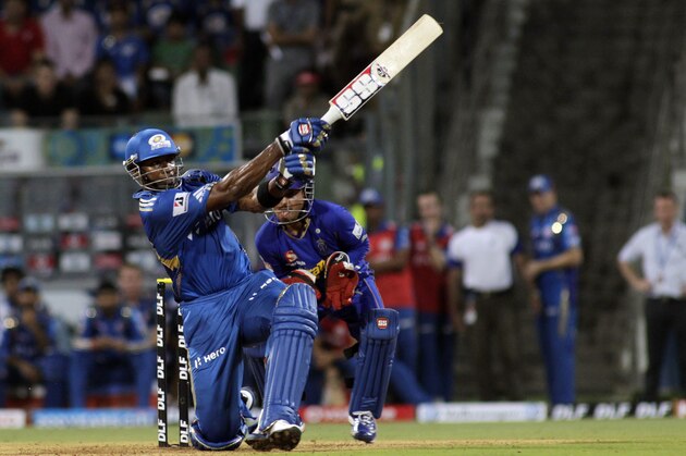 Kieron Pollard of Mumbai Indians plays a shot during the Indian Premier League (IPL) cricket match against Rajasthan Royals in Mumbai, India, Wednesday, April 11, 2012. (AP Photo/Rajanish Kakade)