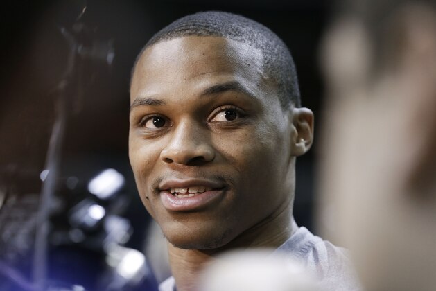 Oklahoma City Thunder guard Russell Westbrook talks with reporters after practice on Friday, April 25, 2014, in Memphis, Tenn. The Thunder face the Memphis Grizzlies on Saturday in Game 4 of their opening-round NBA basketball playoff series. The Grizzlies lead the series 2-1. (AP Photo/Mark Humphrey)