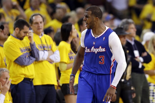 Los Angeles Clippers' Chris Paul (3) celebrates after making a 3-point basket against the Golden State Warriors during the second half in Game 3 of an opening-round NBA basketball playoff series on Thursday, April 24, 2014, in Oakland, Calif. Los Angeles won 98-96. (AP Photo/Marcio Jose Sanchez)