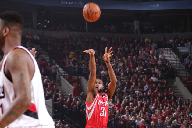 PORTLAND, OR - APRIL 25: Troy Daniels #30 of the Houston Rockets shoots against the Portland Trail Blazers in Game Three of the Western Conference Quarterfinals during the 2014 NBA Playoffs on April 25, 2014 at the Moda Center in Portland, Oregon. NOTE TO USER: User expressly acknowledges and agrees that, by downloading and or using this photograph, User is consenting to the terms and conditions of the Getty Images License Agreement. Mandatory Copyright Notice: Copyright 2014 NBAE (Photo by Sam Forencich/NBAE via Getty Images)