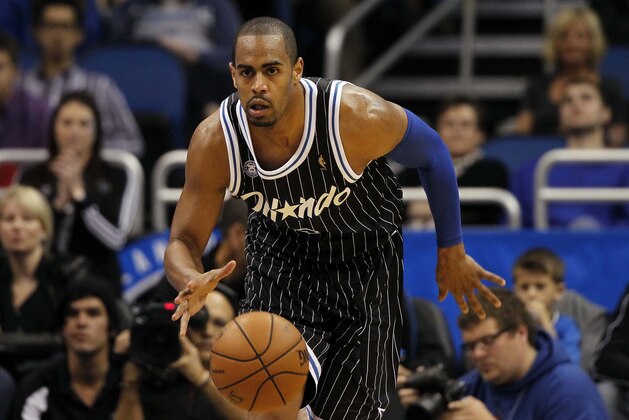 Jan 17, 2014; Orlando, FL, USA; Orlando Magic shooting guard Arron Afflalo (4) drives to the basket against the Charlotte Bobcats during the second half at Amway Center. Charlotte Bobcats defeated the Orlando Magic 111-101. Mandatory Credit: Kim Klement-USA TODAY Sports