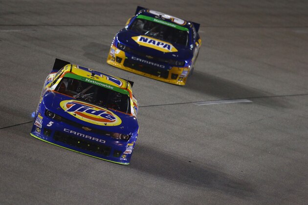 RICHMOND, VA - APRIL 25: Kevin Harvick, driver of the #5 Tide Chevrolet, leads Chase Elliott, driver of the #9 NAPA Auto Parts Chevrolet, during the NASCAR Nationwide Series ToyotaCare 250 at Richmond International Raceway on April 25, 2014 in Richmond, Virginia.  (Photo by Streeter Lecka/Getty Images)