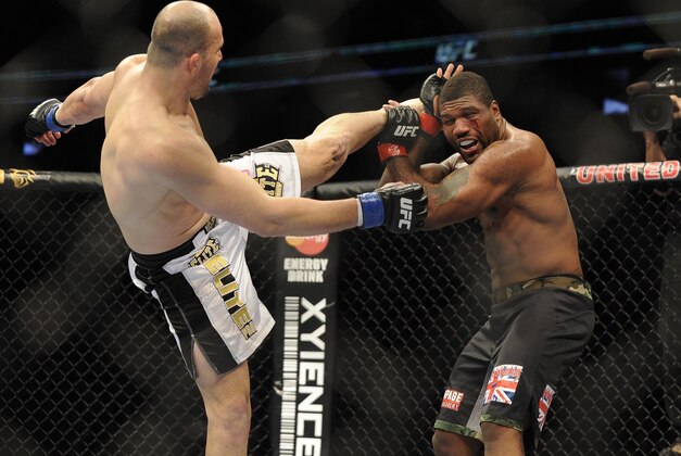 Jan 26, 2013; Chicago, IL, USA;  Rampage Jackson (black shorts) fights against Glover Teixeira (black and white shorts) during UFC on FOX 6 at the United Center.  Mandatory Credit: David Banks-USA TODAY Sports