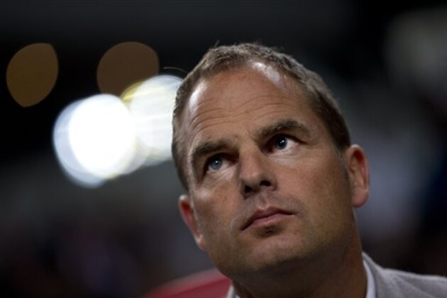 Ajax coach Frank de Boer watches his players at the start of the national soccer league game match against Twente at ArenA stadium in Amsterdam, Netherlands, Saturday Sept. 29, 2012. (AP Photo/Peter Dejong) Ajax coach Frank de Boer watches his players at the start of the national soccer league game match against Twente at ArenA stadium in Amsterdam, Netherlands, Saturday Sept. 29, 2012. (AP Photo/Peter Dejong)