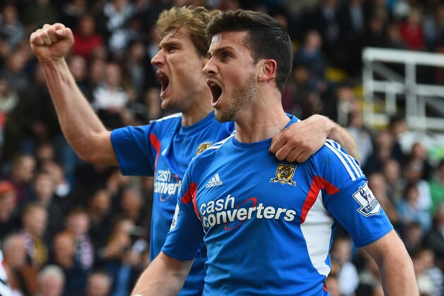 LONDON, ENGLAND - APRIL 26:  Shane Long of Hull celebrates with fellow goalscorer Nikica Jelavic after equalising during the Barclays Premier League match between Fulham and Hull City at Craven Cottage on April 26, 2014 in London, England.  (Photo by Mike Hewitt/Getty Images)