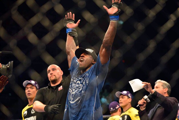 Aug 3, 2013; Rio De Janeiro, Brazil; Phil Davis (pink shorts) celebrates after defeating Lyoto Machida (not pictured) during UFC 163 at HSBC Arena. Mandatory Credit: Jason Silva-USA TODAY Sports
