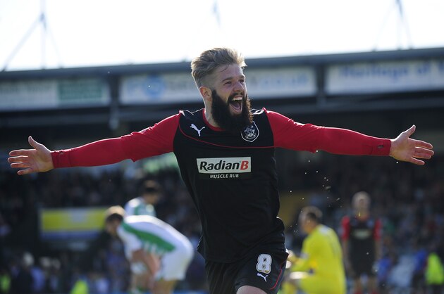 YEOVIL, ENGLAND - APRIL 21:  Adam Clayton of Huddersfield Town celebrates scoring his side's second goal during the Sky Bet Championship match between Yeovil Town and Huddersfield Town at Huish Park on April 21, 2014 in Torquay, England.  (Photo by Dan Mullan/Getty Images)