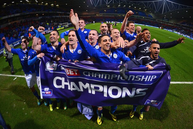BOLTON, ENGLAND - APRIL 22:  Leicester City players celebrate winning the Championship after the Sky Bet Championship match between Bolton Wanderers and Leicester City at Reebok Stadium on April 22, 2014 in Bolton, England.  (Photo by Michael Regan/Getty Images)