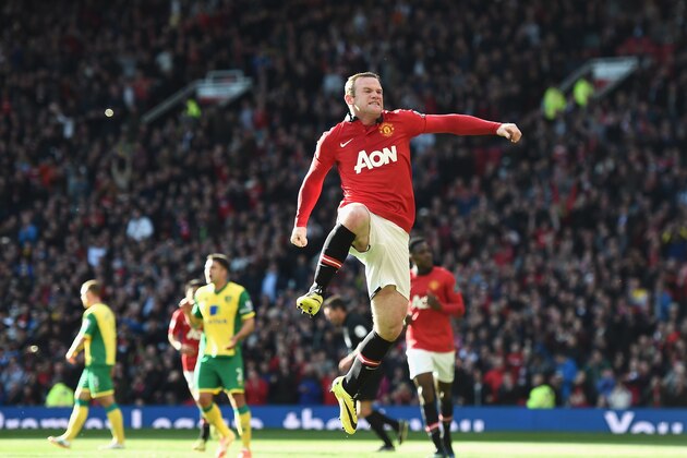 MANCHESTER, ENGLAND - APRIL 26: Wayne Rooney of Manchester United celebrates his first half penalty during the Barclays Premier League match between Manchester United and Norwich City at Old Trafford on April 26, 2014 in Manchester, England.  (Photo by Laurence Griffiths/Getty Images)