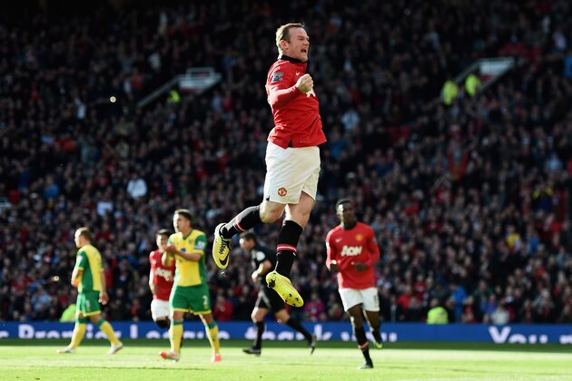 MANCHESTER, ENGLAND - APRIL 26: Wayne Rooney of Manchester United celebrates his first half penalty during the Barclays Premier League match between Manchester United and Norwich City at Old Trafford on April 26, 2014 in Manchester, England.  (Photo by Laurence Griffiths/Getty Images)