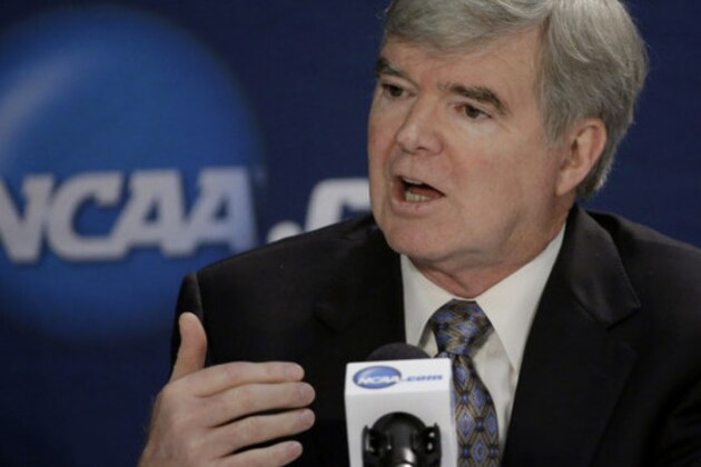 NCAA President Mark Emmert answers a question at a news conference Sunday, April 6, 2014, in Arlington, Texas. (AP Photo/David J. Phillip)