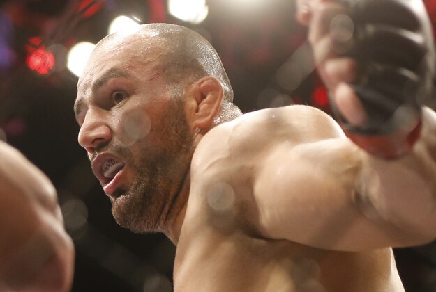 Glover Teixeira, right, from Brazil, fights Fabio Maldonado, from Brazil, during their heavyweight mixed martial arts bout at the Ultimate Fighting Championship (UFC) 153 in Rio de Janeiro, Brazil, Sunday Oct.  14, 2012. Teixeira defeated Maldonado. (AP Photo/Felipe Dana)