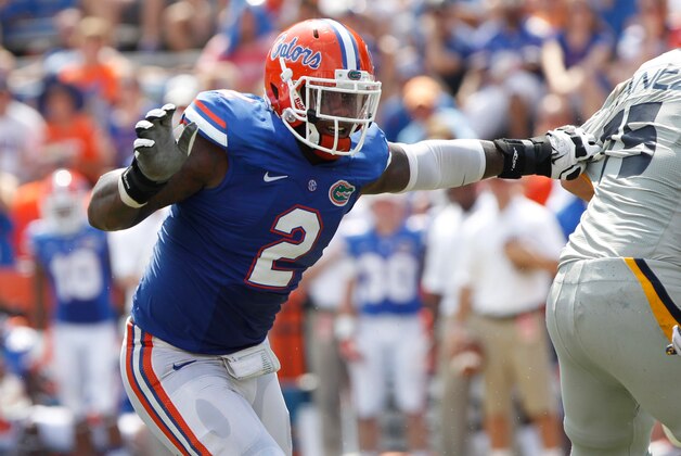 Aug 31, 2013; Gainesville, FL, USA; Florida Gators defensive lineman Dominique Easley (2) rushes against the Toledo Rockets during the second half at Ben Hill Griffin Stadium. Florida Gators defeated the Toledo Rockets 24-6. Mandatory Credit: Kim Klement-USA TODAY Sports