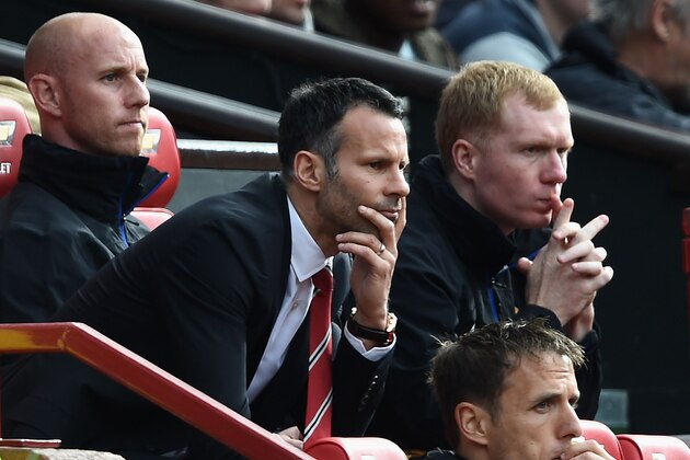 MANCHESTER, ENGLAND - APRIL 26:  Ryan Giggs of Manchester United looks on from the dug out during the Barclays Premier League match between Manchester United and Norwich City at Old Trafford on April 26, 2014 in Manchester, England.  (Photo by Laurence Griffiths/Getty Images)
