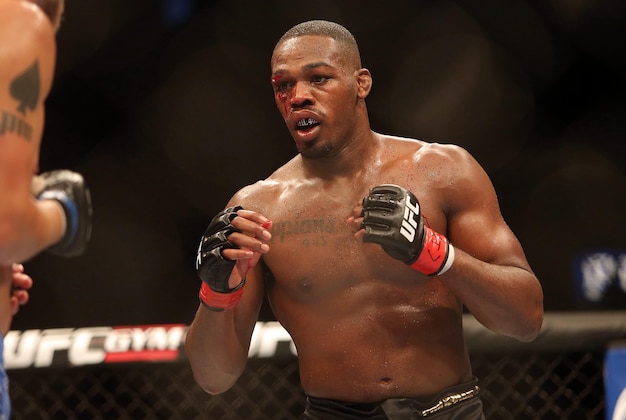 Sep 21, 2013; Toronto, Ontario, CAN; Jon Jones fights Alexander Gustafsson (left) during their light heavyweight championship bout at UFC 165 at the Air Canada Centre. Mandatory Credit: Tom Szczerbowski-USA TODAY Sports
