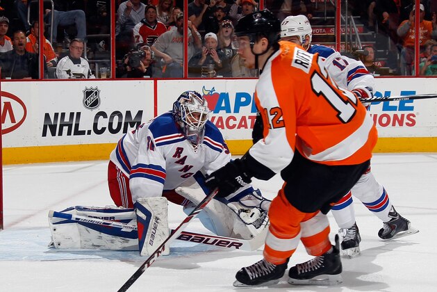PHILADELPHIA, PA - APRIL 25: Michael Raffl #12 of the Philadelphia Flyers misses a shot against Henrik Lundqvist #30 of the New York Rangers during the second period in Game Four of the First Round of the 2014 NHL Stanley Cup Playoffs at the Wells Fargo Center on April 25, 2014 in Philadelphia, Pennsylvania.  (Photo by Bruce Bennett/Getty Images)
