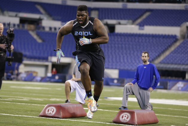 Delaware defensive lineman Zach Kerr runs a drill at the NFL football scouting combine in Indianapolis, Monday, Feb. 24, 2014. (AP Photo/Michael Conroy) Delaware defensive lineman Zach Kerr runs a drill at the NFL football scouting combine in Indianapolis, Monday, Feb. 24, 2014. (AP Photo/Michael Conroy)
