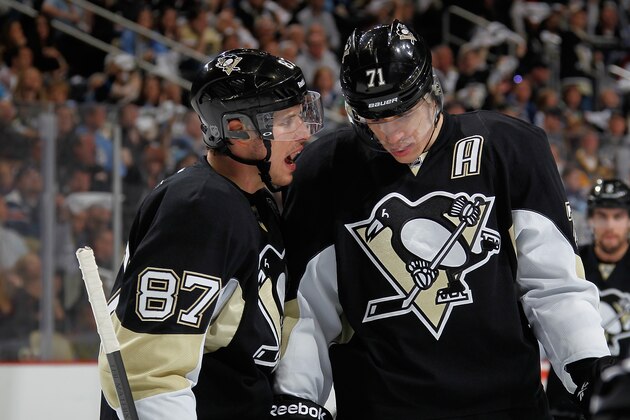 PITTSBURGH, PA - APRIL 26:  Sidney Crosby #87 talks with Evgeni Malkin #71 of the Pittsburgh Penguins during the third period against the Columbus Blue Jackets in Game Five of the First Round of the 2014 Stanley Cup Playoffs at Consol Energy Center on April 26, 2014 in Pittsburgh, Pennsylvania.  (Photo by Gregory Shamus/NHLI via Getty Images)