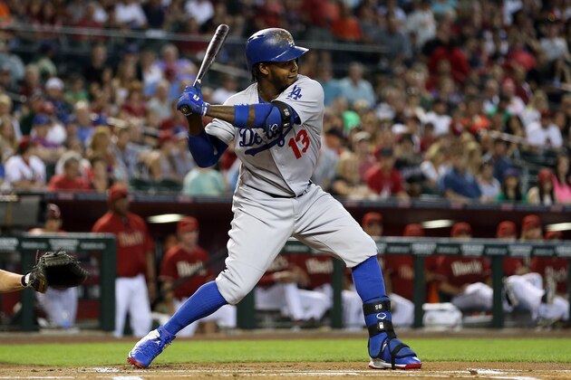 PHOENIX, AZ - APRIL 13:  Hanley Ramirez #13 of the Los Angeles Dodgers bats against the Arizona Diamondbacks during the MLB game at Chase Field on April 13, 2014 in Phoenix, Arizona. The Dodgers defeated the Diamondbacks 8-6.  (Photo by Christian Petersen/Getty Images)
