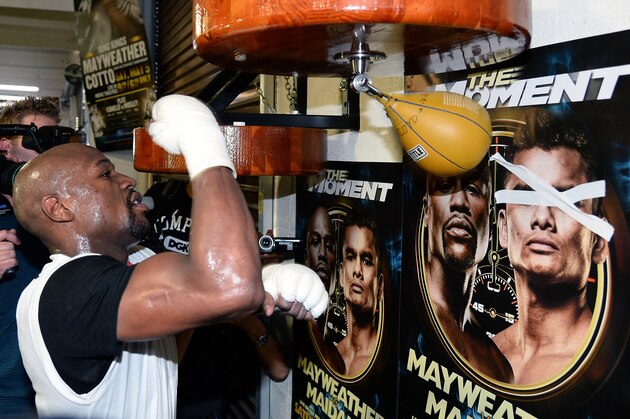 LAS VEGAS, NV - APRIL 22:  Boxer Floyd Mayweather Jr. works out at the Mayweather Boxing Club on April 22, 2014 in Las Vegas, Nevada. Mayweather will face Marcos Maidana in a 12-round world championship unification bout in Las Vegas on May 3.  (Photo by Ethan Miller/Getty Images)