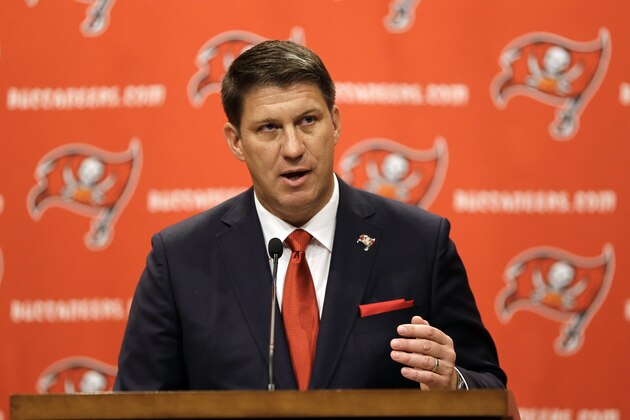New Tampa Bay Buccaneers general manager Jason Licht gestures during an NFL football news conference Thursday, Jan. 23, 2014, in Tampa, Fla. Licht becomes the fifth general manager in team history.  He takes over a team that hasn't made the playoffs since 2007. (AP Photo/Chris O'Meara)