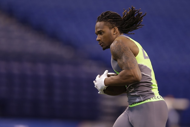 Ohio State defensive back Bradley Roby runs a drill at the NFL football scouting combine in Indianapolis, Tuesday, Feb. 25, 2014. (AP Photo/Michael Conroy)