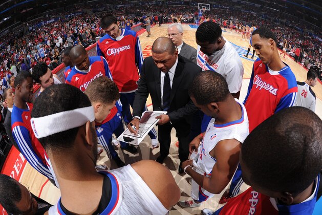 LOS ANGELES, CA - OCTOBER 31: Members of the Los Angeles Clippers huddle with Doc Rivers before a game against the Golden State Warriors at STAPLES Center on October 31, 2013 at in Los Angeles, California. NOTE TO USER: User expressly acknowledges and agrees that, by downloading and/or using this Photograph, user is consenting to the terms and conditions of the Getty Images License Agreement. Mandatory Copyright Notice: Copyright 2013 NBAE (Photo by Andrew D. Bernstein/NBAE via Getty Images)