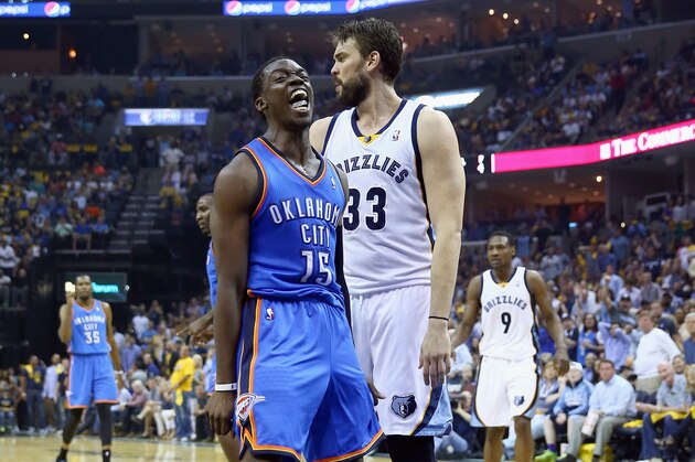 Oklahoma City Thunder guard Reggie Jackson is congratulated after making a free throw in the final seconds of overtime in Game 4 of an opening-round NBA basketball playoff series against the Memphis Grizzlies Saturday, April 26, 2014, in Memphis, Tenn. Jackson scored 32 points as Oklahoma City won 92-89. (AP Photo/Mark Humphrey)