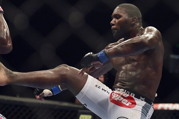Apr 26, 2014; Baltimore, MD, USA;   Anthony Johnson (blue gloves) fights Phil Davis (red gloves) during UFC 172 at Baltimore Arena.  Mandatory Credit: Tommy Gilligan-USA TODAY Sports