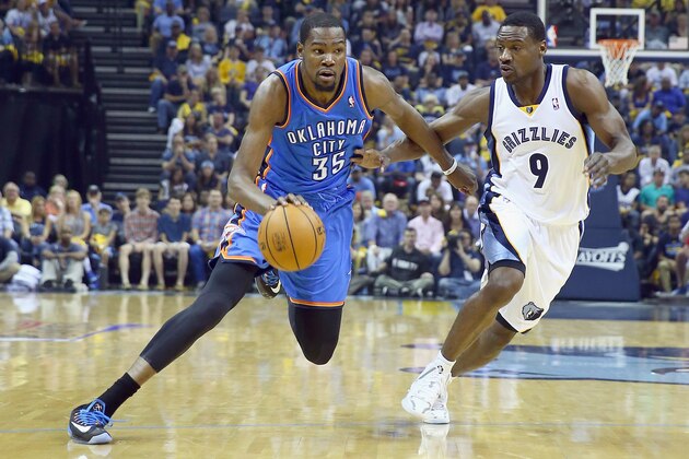 MEMPHIS, TN - APRIL 26:  Kevin Durant #35 of the Oklahoma City Thunder dribbles the ball while defended by Tony Allen #9 of the Memphis Grizzlies in Game 4 of the Western Conference Quarterfinals during the 2014 NBA Playoffs at FedExForum on April 26, 2014 in Memphis, Tennessee. NOTE TO USER: User expressly acknowledges and agrees that, by downloading and or using this photograph, User is consenting to the terms and conditions of the Getty Images License Agreement.  (Photo by Andy Lyons/Getty Images)