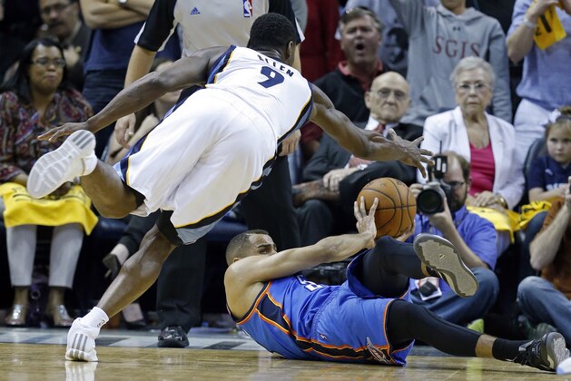 Memphis Grizzlies guard Tony Allen (9) and Oklahoma City Thunder guard Thabo Sefolosha, right, battle for the ball in the second half of Game 3 of an opening-round NBA basketball playoff series Thursday, April 24, 2014, in Memphis, Tenn. The Grizzlies won 98-95 in overtime. (AP Photo/Mark Humphrey)