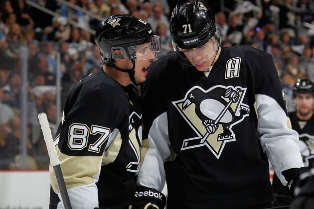 PITTSBURGH, PA - APRIL 26:  Sidney Crosby #87 talks with Evgeni Malkin #71 of the Pittsburgh Penguins during the third period against the Columbus Blue Jackets in Game Five of the First Round of the 2014 Stanley Cup Playoffs at Consol Energy Center on April 26, 2014 in Pittsburgh, Pennsylvania.  (Photo by Gregory Shamus/NHLI via Getty Images)