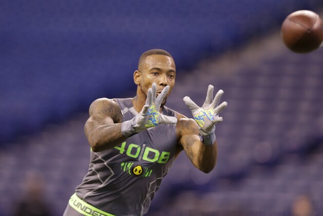 Utah defensive back Keith McGill runs a drill at the NFL football scouting combine in Indianapolis, Tuesday, Feb. 25, 2014. (AP Photo/Michael Conroy)
