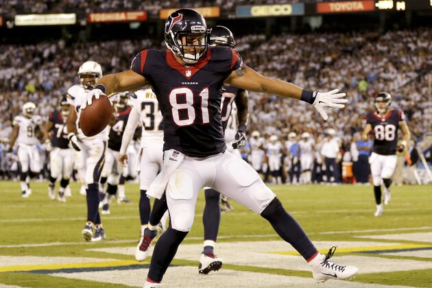Houston Texans tight end Owen Daniels celebrates a touchdown against the San Diego Chargers during the second half of an NFL football game Monday, Sept. 9, 2013, in San Diego. (AP Photo/Gregory Bull)