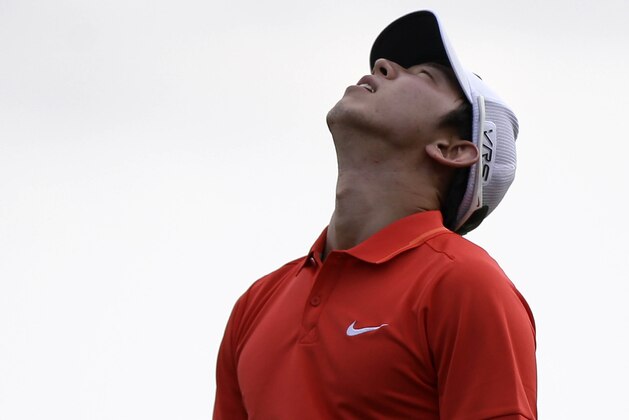 Noh Seung-yul, of South Korea, rocks his head towards the sky on the 18th green after winning the Zurich Classic golf tournament at TPC Louisiana in Avondale, La., Sunday, April 27, 2014. (AP Photo/Bill Haber)