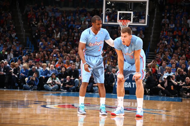 OKLAHOMA CITY, OK - FEBRUARY 23: Blake Griffin #32 of the Los Angeles Clippers and Chris Paul #3 of the Los Angeles Clippers react during a game at Chesapeake Energy Arena on February 23, 2014 in Oklahoma City, Oklahoma. NOTE TO USER: User expressly acknowledges and agrees that, by downloading and/or using this photograph, user is consenting to the terms and conditions of the Getty Images License Agreement.  Mandatory Copyright Notice: Copyright 2014 NBAE (Photo by Nathaniel S. Butler/NBAE via Getty Images)