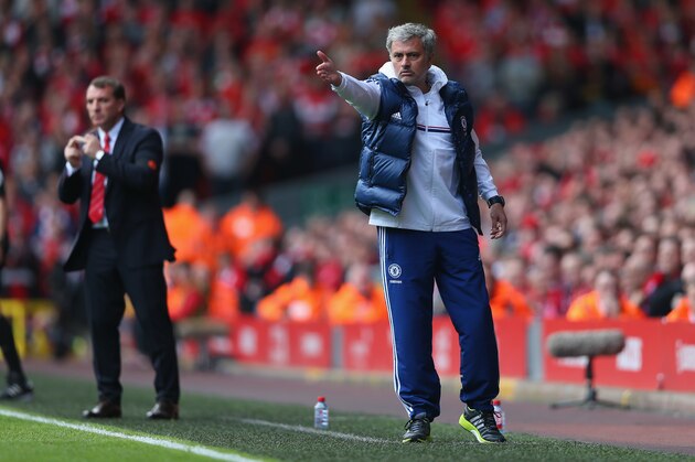 LIVERPOOL, ENGLAND - APRIL 27:   Jose Mourinho manager of Chelsea gives his team instructions during the Barclays Premier League match between Liverpool and Chelsea at Anfield on April 27, 2014 in Liverpool, England.  (Photo by Clive Brunskill/Getty Images)