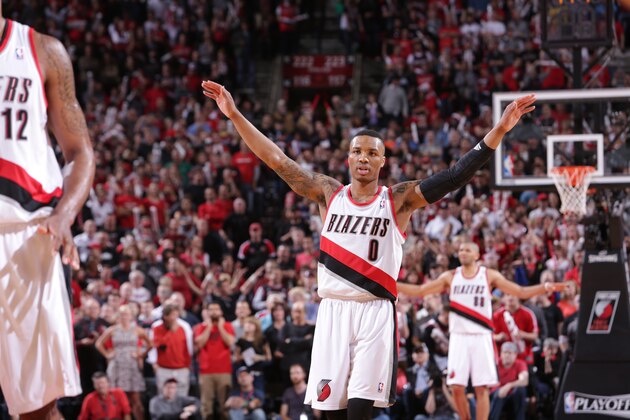PORTLAND, OR - APRIL 27: Damian Lillard #0 of the Portland Trail Blazers celebrates during a game against the Houston Rockets in Game Four of the Western Conference Quarterfinals during the 2014 NBA Playoffs on April 27, 2014 at the Moda Center in Portland, Oregon. NOTE TO USER: User expressly acknowledges and agrees that, by downloading and or using this photograph, User is consenting to the terms and conditions of the Getty Images License Agreement. Mandatory Copyright Notice: Copyright 2014 NBAE (Photo by Sam Forencich/NBAE via Getty Images) PORTLAND, OR - APRIL 27: Damian Lillard #0 of the Portland Trail Blazers celebrates during a game against the Houston Rockets in Game Four of the Western Conference Quarterfinals during the 2014 NBA Playoffs on April 27, 2014 at the Moda Center in Portland, Oregon. NOTE TO USER: User expressly acknowledges and agrees that, by downloading and or using this photograph, User is consenting to the terms and conditions of the Getty Images License Agreement. Mandatory Copyright Notice: Copyright 2014 NBAE (Photo by Sam Forencich/NBAE via Getty Images)