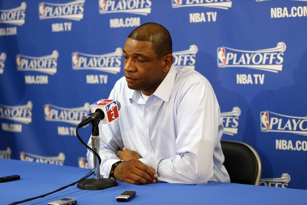 Los Angeles Clippers head coach Doc Rivers, right, answers questions during a pregame news conference before Game 4 of an opening-round NBA basketball playoff series against the Golden State Warriors on Sunday, April 27, 2014, in Oakland, Calif. (AP Photo/Marcio Jose Sanchez)