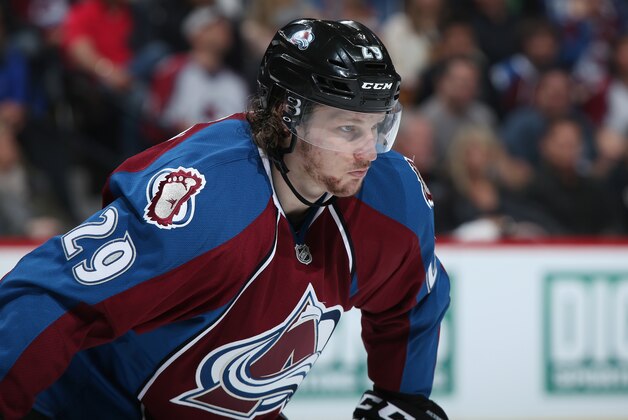 DENVER, CO - APRIL 26:  Nathan MacKinnon #29 of the Colorado Avalanche looks on during a break in the action as he went on to score the game winning goal against the Minnesota Wild Game Five of the First Round of the 2014 NHL Stanley Cup Playoffs at Pepsi Center on April 26, 2014 in Denver, Colorado. The Avalanche defeated the Wild 4-3 in overtime to take a 3-2 game lead in the series.  (Photo by Doug Pensinger/Getty Images)
