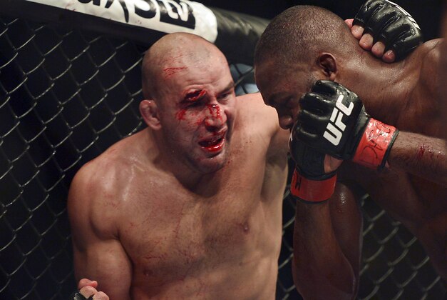 Apr 26, 2014; Baltimore, MD, USA; A cut opens up over the eye of Glover Teixeira during the UFC light heavy weight championship fight against Jon Jones at Baltimore Arena. Jones retained the light heavy height championship by defeating Teixeria. Mandatory Credit: Tommy Gilligan-USA TODAY Sports Apr 26, 2014; Baltimore, MD, USA; A cut opens up over the eye of Glover Teixeira during the UFC light heavy weight championship fight against Jon Jones at Baltimore Arena. Jones retained the light heavy height championship by defeating Teixeria. Mandatory Credit: Tommy Gilligan-USA TODAY Sports