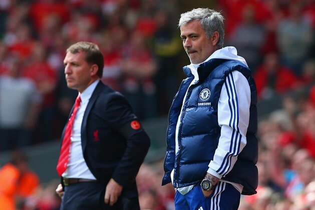 LIVERPOOL, ENGLAND - APRIL 27:  Manager Brendan Rodgers of Liverpool and Jose Mourinho manager of Chelsea look on from the touchline during the Barclays Premier League match between Liverpool and Chelsea at Anfield on April 27, 2014 in Liverpool, England.  (Photo by Clive Brunskill/Getty Images)