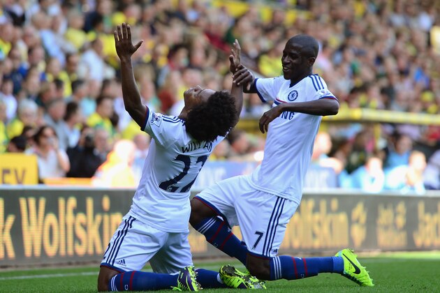 NORWICH, ENGLAND - OCTOBER 06:  Willian of Chelsea celebrates scoring their third goal with Ramires of Chelsea during the Barclays Premier League match between Norwich City and Chelsea at Carrow Road on October 6, 2013 in Norwich, England.  (Photo by Jamie McDonald/Getty Images)