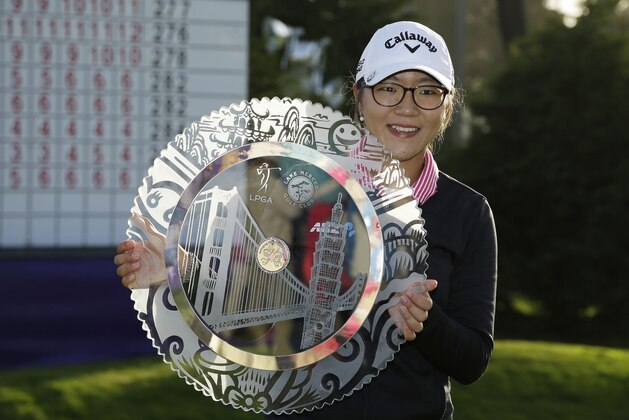 Lydia Ko of New Zealand poses with her trophy on the 18th green of the Lake Merced Golf Club after winning the Swinging Skirts LPGA Classic golf tournament on Sunday, April 27, 2014, in Daly City, Calif. Ko won the event after shooting a 3-under-par 69 to finish at 12-under-par. (AP Photo/Eric Risberg) Lydia Ko of New Zealand poses with her trophy on the 18th green of the Lake Merced Golf Club after winning the Swinging Skirts LPGA Classic golf tournament on Sunday, April 27, 2014, in Daly City, Calif. Ko won the event after shooting a 3-under-par 69 to finish at 12-under-par. (AP Photo/Eric Risberg)