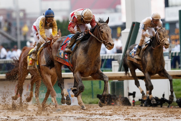 LOUISVILLE, KY - MAY 04:  Jockey Joel Rosario guides Orb to the finish line to win the 139th running of the Kentucky Derby at Churchill Downs on May 4, 2013 in Louisville, Kentucky.  (Photo by Rob Carr/Getty Images)